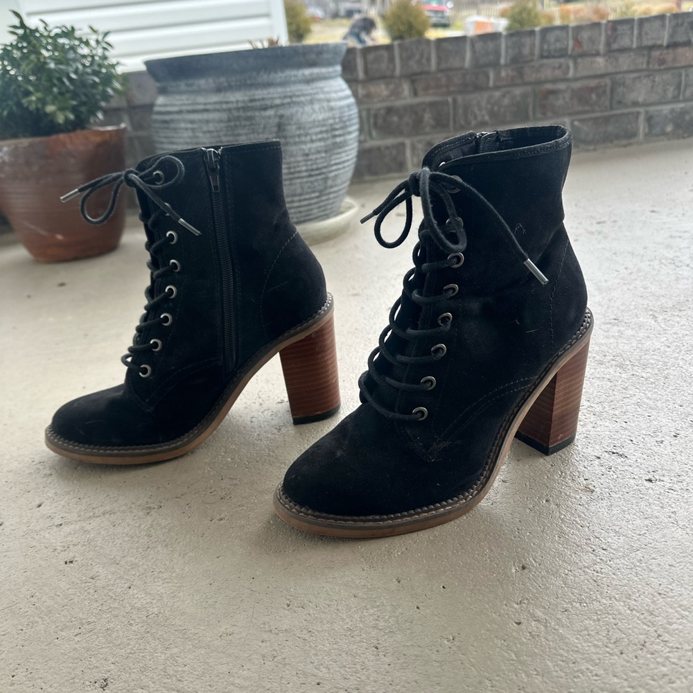Laced black boots